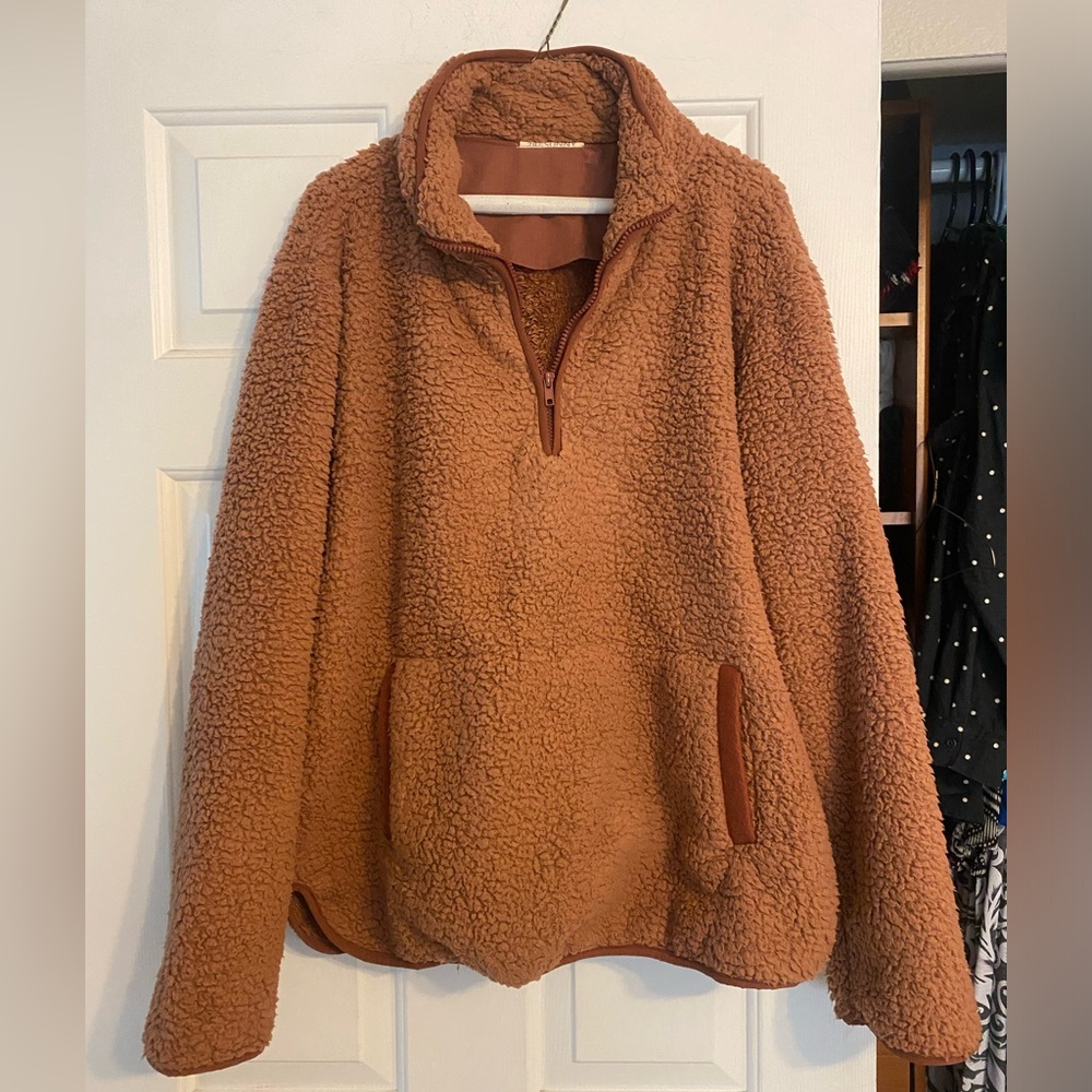 Super soft and fuzzy fleece pullover with pockets!